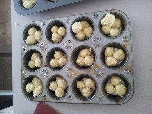 Cloverleaf-style brioche rolls in the pan